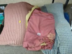 Two vintage woollen waffle blankets and an embroidered bed throw