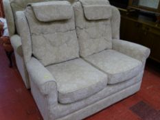 Light floral upholstered two seater couch