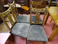Set of four oak dining chairs with tapestry upholstered seats