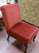 Single red upholstered bedroom chair