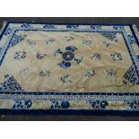 Medium sized blue and floral fringed carpet, 275 x 185 cms