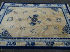 Medium sized blue and floral fringed carpet, 275 x 185 cms