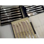 Three cased sets of hallmarked silver handled butter knives