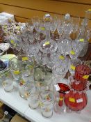 A good parcel of quality drinking glasses & decanters together with a vintage lemonade set, ruby