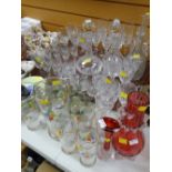 A good parcel of quality drinking glasses & decanters together with a vintage lemonade set, ruby