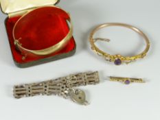 A 9ct gold amethyst & seed pearl bar brooch, hallmarked silver gate bracelet & two yellow metal