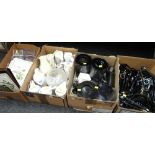 Four boxes of various hotelware items including electric kettles, water filters, place mats etc
