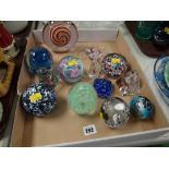 A collection of ornamental paperweights