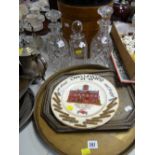 Two metalware trays together with a decorative plate & three decanters