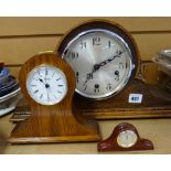 A Napoleon-style oak mantel clock together with two smaller modern clocks