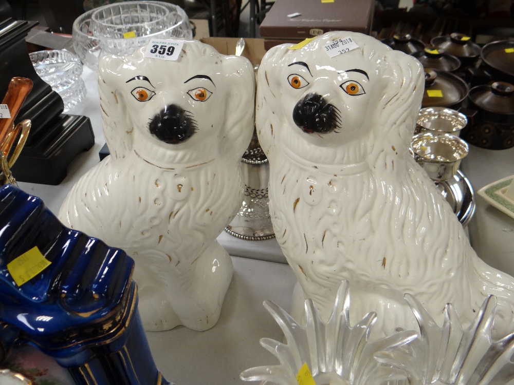 Pair of large white glazed Staffordshire dogs