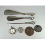 A silver ladies pocket watch (A/F), silver handled shoe horns etc