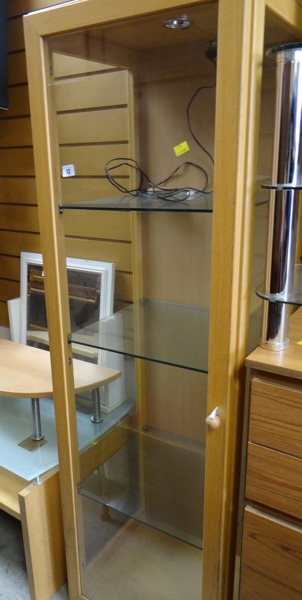 A modern beech wood tall display cabinet, toilet mirror etc