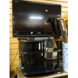 A Toshiba 32-inch flatscreen TV & modern stand E/T