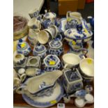 Two trays of blue & white china including willow pattern part-teaset, modern lidded ginger jars etc