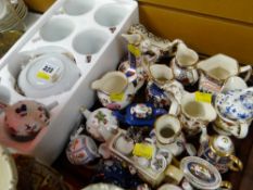 A collection of miniature Masons Ironstone jugs, small teaset, miniature teapots etc