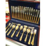 A boxed canteen of Grosvenor gold plated cutlery