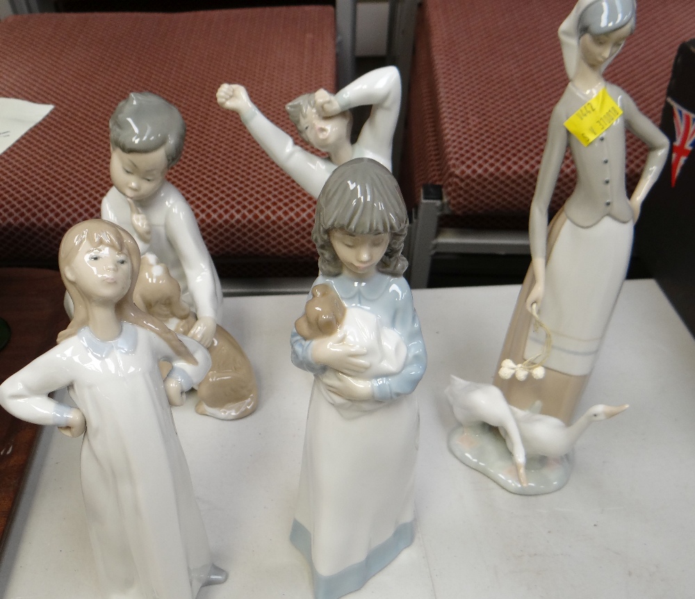 Five Lladro figures of children