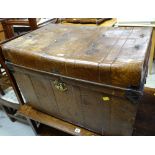 A vintage tin cabin trunk