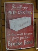 A vintage painted metal advertising sign for Brooke Bond