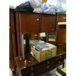 A Stag Minstrel two-door wardrobe & matching dressing table with tri-fold mirror