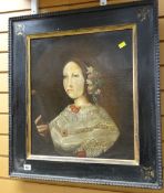 An antique naive-style head & shoulders of a female reading in a gilt & ebonized frame