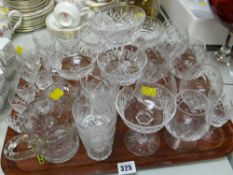 A tray of various drinking glasses