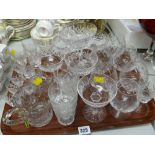 A tray of various drinking glasses