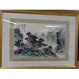 A large gilt framed Oriental watercolour - figure crossing a bridge with waterfalls in background