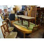 An oval G-Plan lightwood dining table & six matching chairs