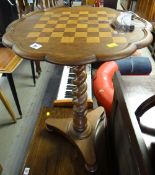 A barley-twist tripod checker table with lobed top