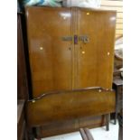 A vintage two-door light wood wardrobe, an Edwardian inlaid dressing table & another together with a