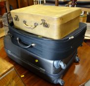 A retro suitcase & two modern suitcases