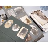 Several albums of early twentieth century photographs together with a collection of postcards