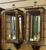 A pair of reproduction mirror backed wall hanging candle boxes