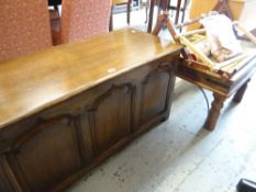 A good reproduction oak blanket box, modern glass top coffee table, a parcel of tapestry equipment