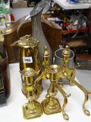 A parcel of metalware including a reproduction miner's lamp together with brass candlesticks, pewter