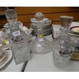 Three cut glass decanters