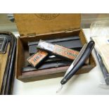 Small box containing collection of vintage cut throat razors