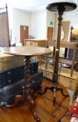 An antique mahogany torchere & an antique barley-twist tripod table