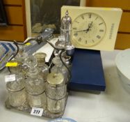 Small parcel of various EPNS items including a cruet set, sugar sifter together with a modern clock