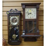 A vintage Vienna-style oak cased wall clock together with a modern wall clock