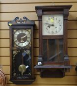 A vintage Vienna-style oak cased wall clock together with a modern wall clock