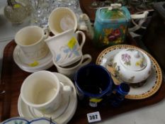 Tray of various pottery including coffeeware, teapot etc