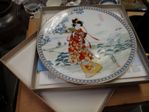 A collection of boxed collector's plates & two others