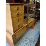 A lightwood mid-century Stag dressing table & matching four-drawer chest etc