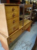 A lightwood mid-century Stag dressing table & matching four-drawer chest etc