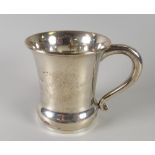 A hallmarked silver christening mug