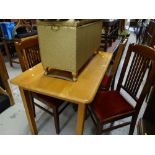 A vintage Lloyd Loom serpentine linen basket, an antique carved chair & a modern table & four