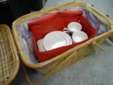 A wicker carry basket & picnic contents